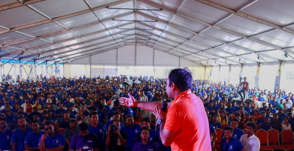 Sakif Ahmed speaking at an industry event